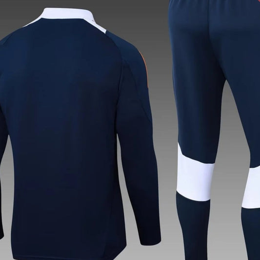 Traje de entrenamiento de media cremallera azul real del Real Madrid 2024/2025