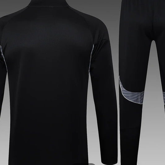 Traje de entrenamiento medio cremallera negro del Real Madrid 2025/2026